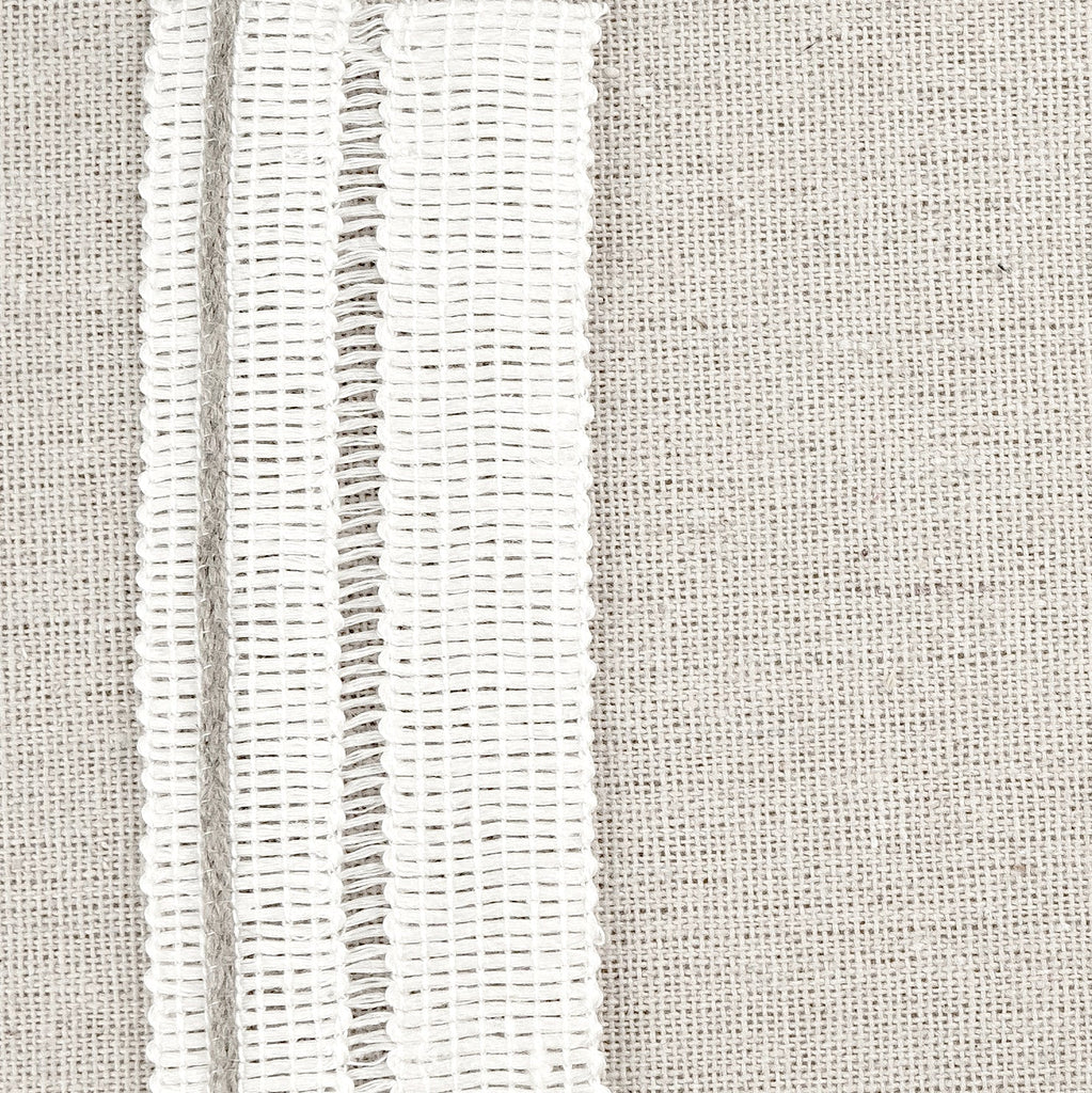 _020 | baia ivory natural - ann rees: A cream colored band trimming featuring a natural linen-colored strip, perfect for adding a subtle, stylish accent to your home decor.