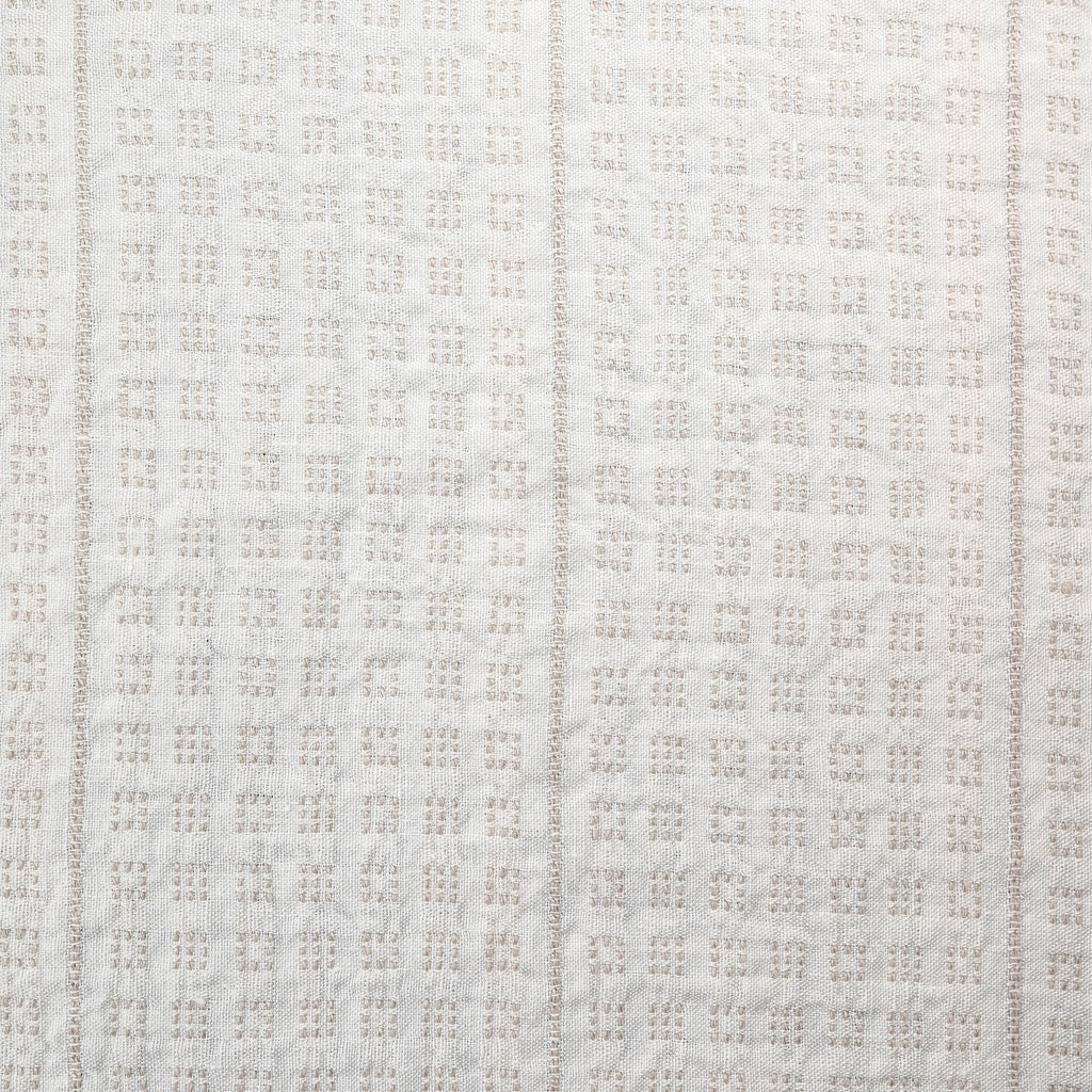 _120 | poppy oatmeal - ann rees: Beige colored linen fabric with delicate camel colored pattern.