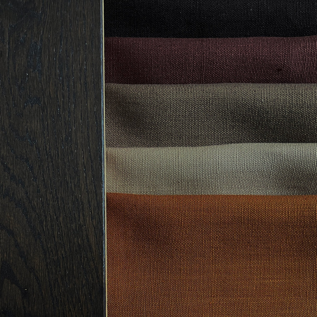 Clay collection - ann rees: Explore a range of warm, earth tone piece-dyed linen fabrics, perfect for infusing natural warmth and timeless beauty into your interior décor.